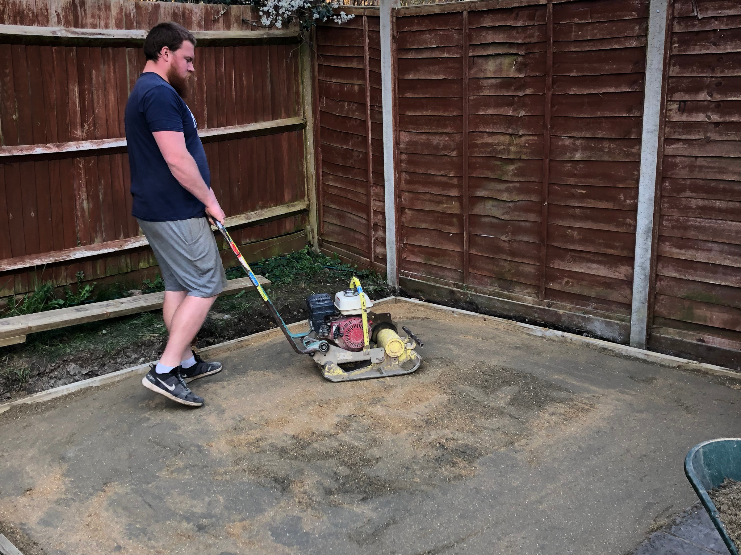 Ground compaction with wacker plate